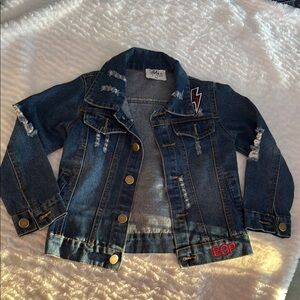 Indigo Blue Jean Jacket with Vibrant Patches and Unique Hem lola boy jacket